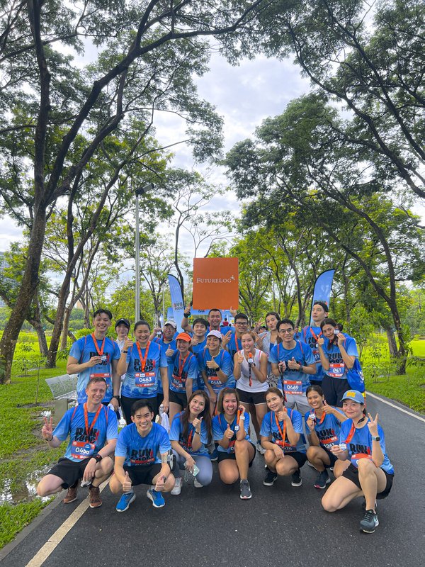 Group of FutureLog team members celebrating their charity run in Bangkok