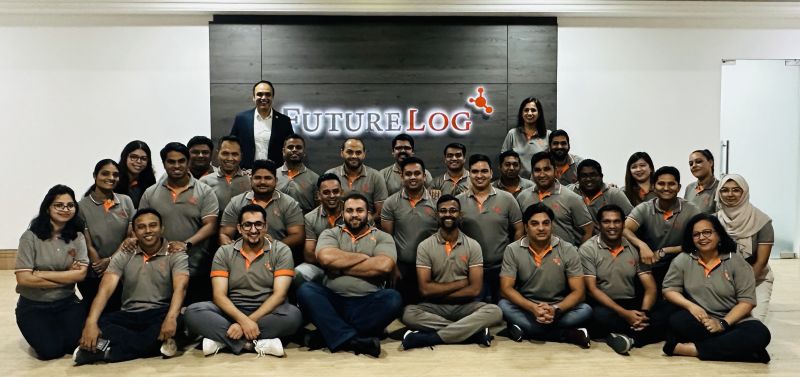 Group photo of FutureLog Dubai team dressed in FutureLog polo shirts